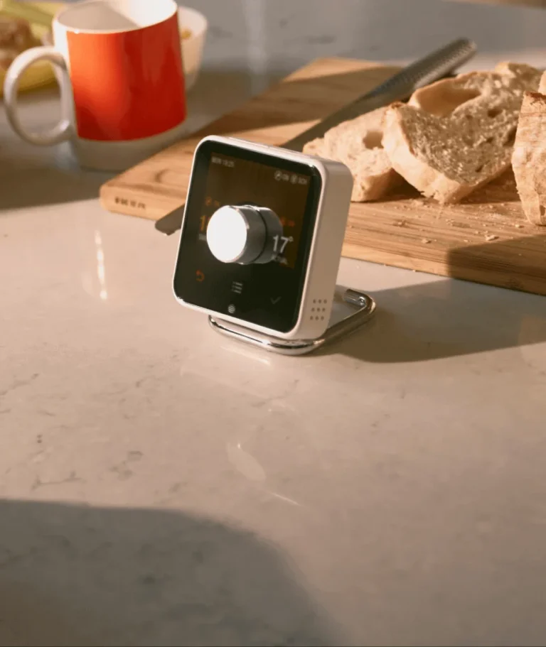 Smart thermostat on kitchen counter