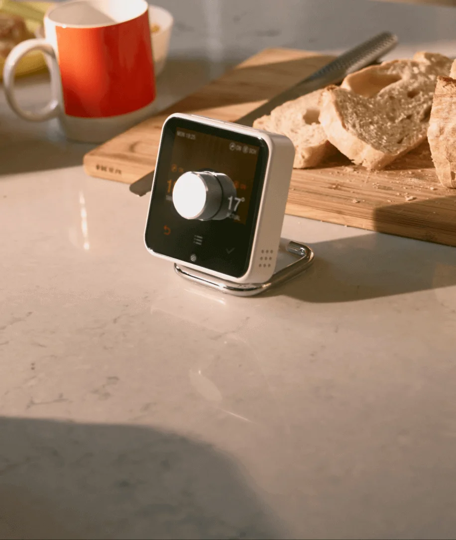 Smart thermostat on kitchen counter